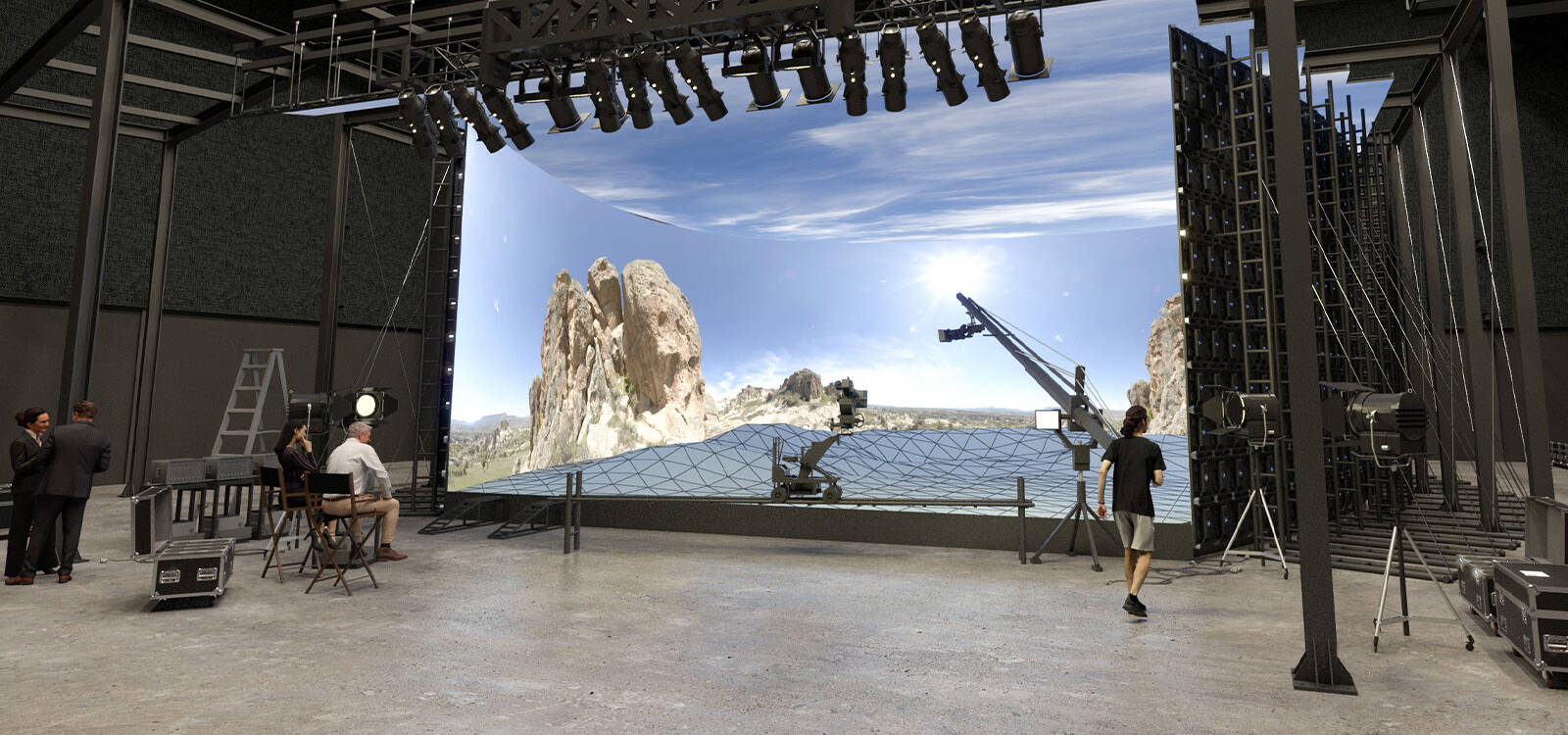 Wide angle shot of a movie studio production set with stage and crew members working